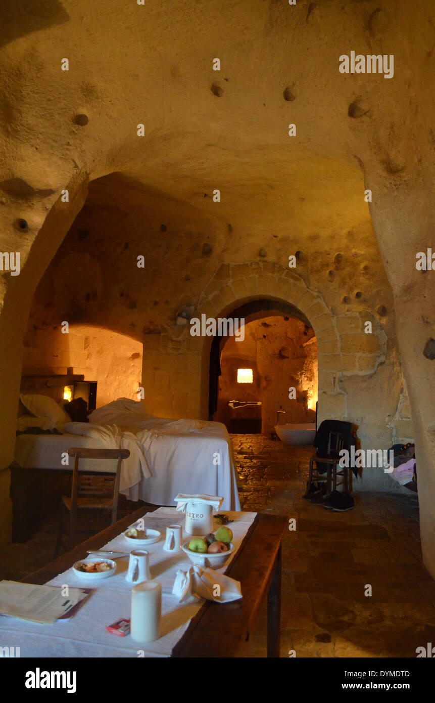 Matera,one of the oldest civilisations of Italy, they lived like trogladytes in caves.This one authenicated for comfort. Stock Photo
