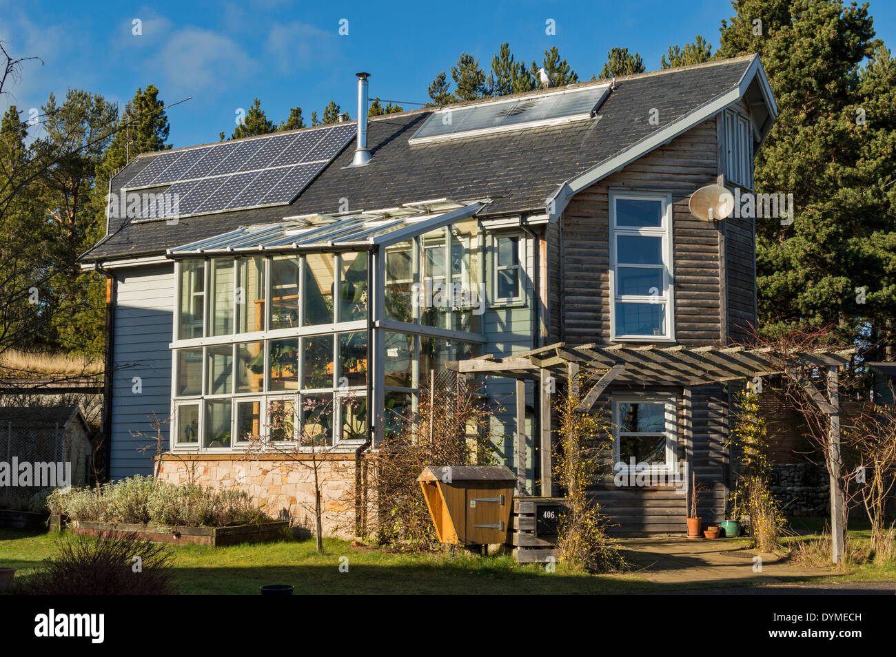 GLASS FRONTED HOUSE IN THE FINDHORN FOUNDATION ECOVILLAGE MORAY Stock