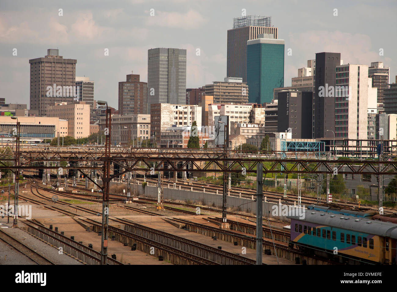 trains and tracks of the central Park Station and the skyline of Johannesburg, Gauteng, South Africa, Africa Stock Photo