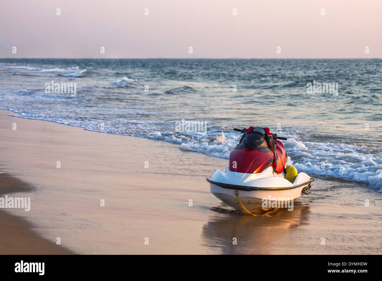 Jet ski on the beach near the ocean Stock Photo