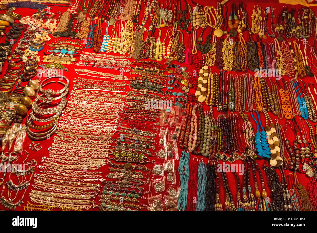 Indian imitation jewelry on the counter of street shop. Night Market in Arpora, Goa, India Stock