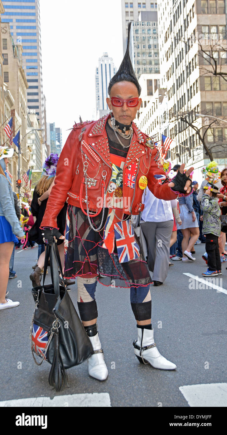 An individualist man in a bizarre outfit with strange jewelry and hair at the Easter Parade on Fifth Avenue in Midtown Manhattan, New York City Stock Photo