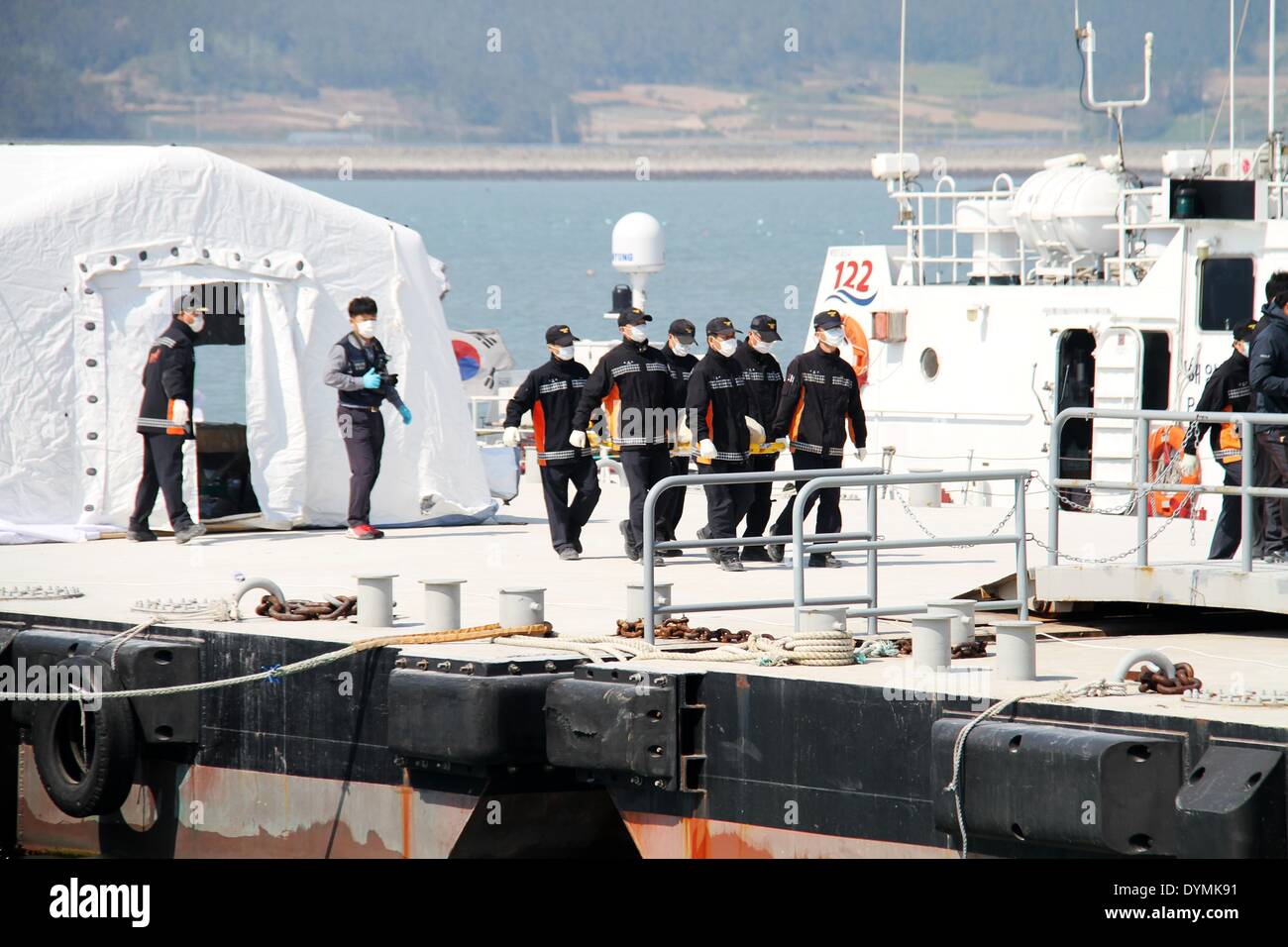 Jindo. 22nd Apr, 2014. South Korean coast guard officers get off the ...