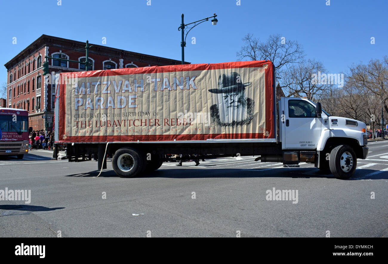 Mitzvah Tanks parading past Lubavitch headquarter to celebrate the birthday of the Lubavitcher Rebbe Menachem Mendel Schneerson. Stock Photo