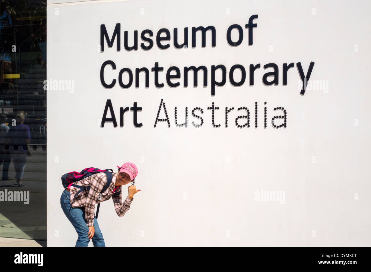 Sydney Australia,West Circular Quay,Museum of Contemporary Art,Asian woman female women,posing,sign,AU140308082 Stock Photo