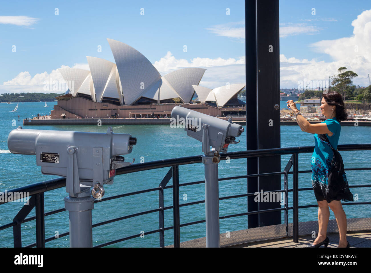 Sydney Australia,Circular Quay,Sydney Harbour,harbor,Parramatta River,water,Opera  House,Asian woman female women,taking telescopic viewer,AU140308107 Stock  Photo - Alamy
