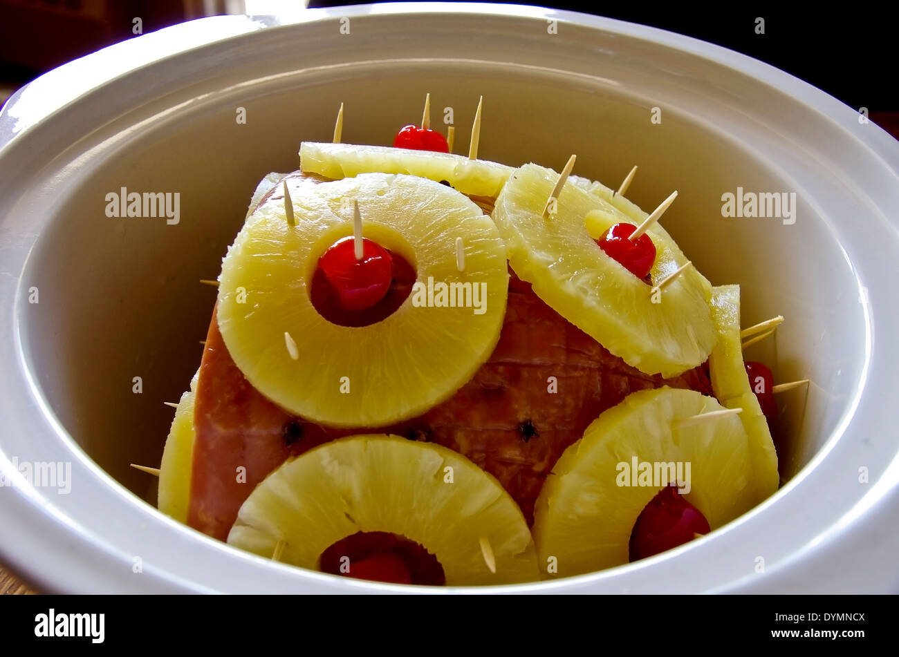 Pineapple ham in crock pot Stock Photo Alamy