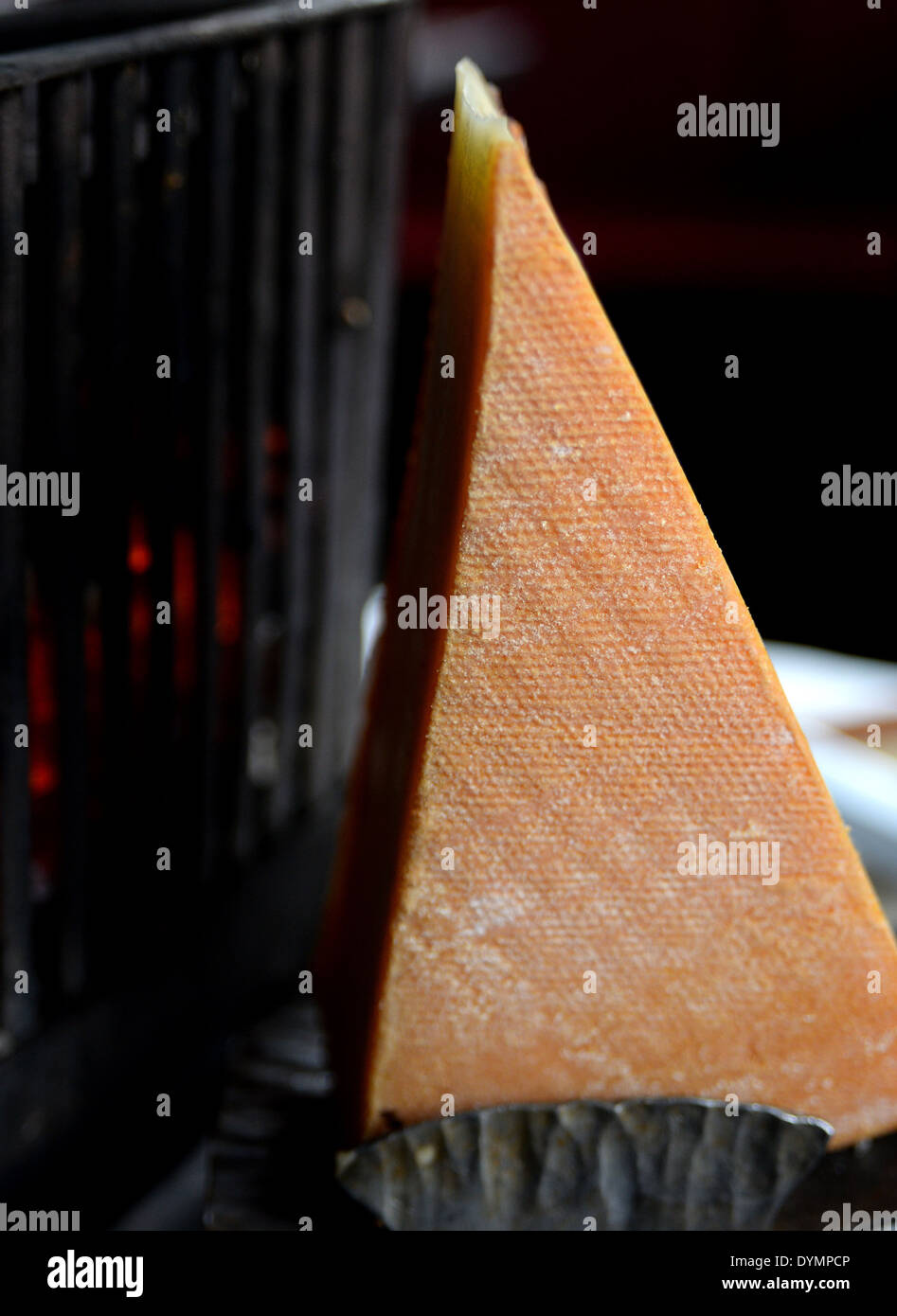 Typical French food that consists in melting cheese for dipping bread