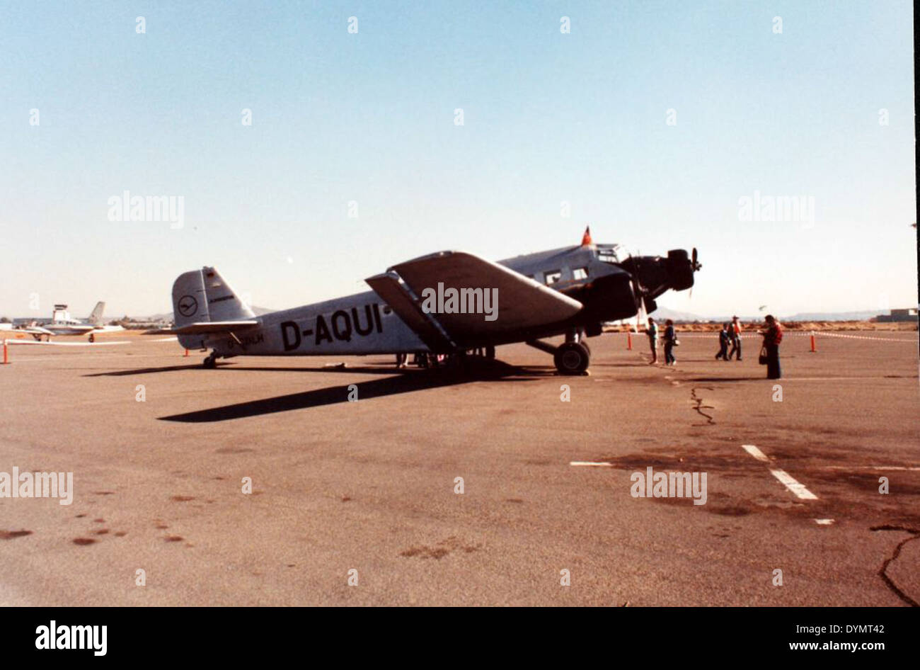 The Junkers Ju-52/3m was a German transport aircraft used during World War II. This tri-motor plane was known for its distinctive corrugated metal fuselage and versatility, serving in various roles such as troop transport and cargo handling. It was widely utilized by the Luftwaffe, with a reputation for reliability during the war. Stock Photo