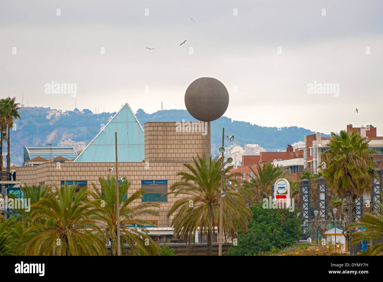 Barcelona, Spain - January 25, 2014: Detail of the Port Olimpic Village in Barcelona with the big sphere sculpture Stock Photo