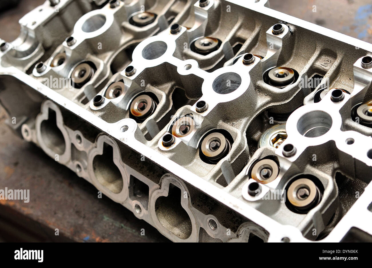 Opened cylinder head from a car engine Stock Photo Alamy