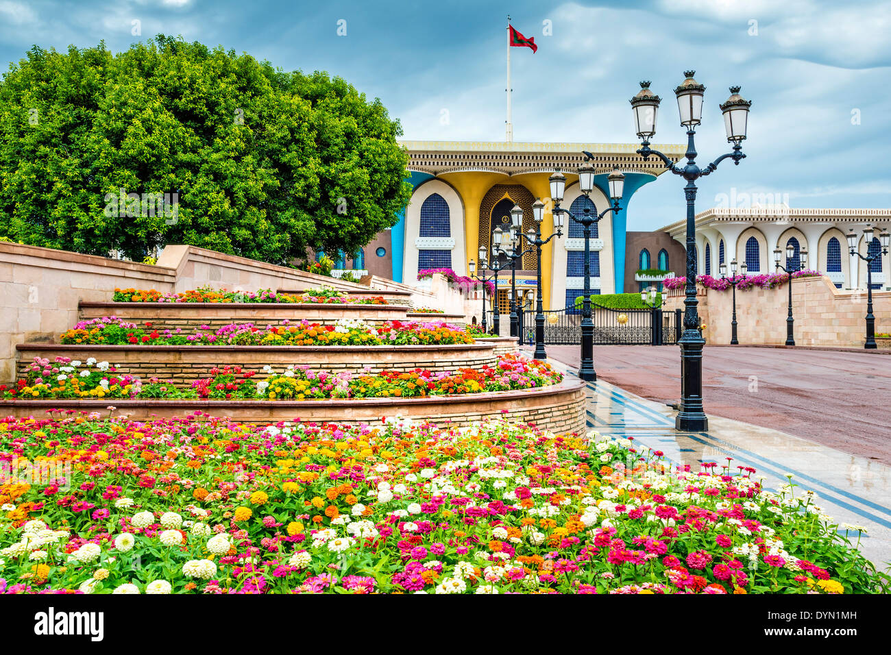 Picture of Sultan Qaboos Palace with flowers in Muscat, Oman Stock Photo