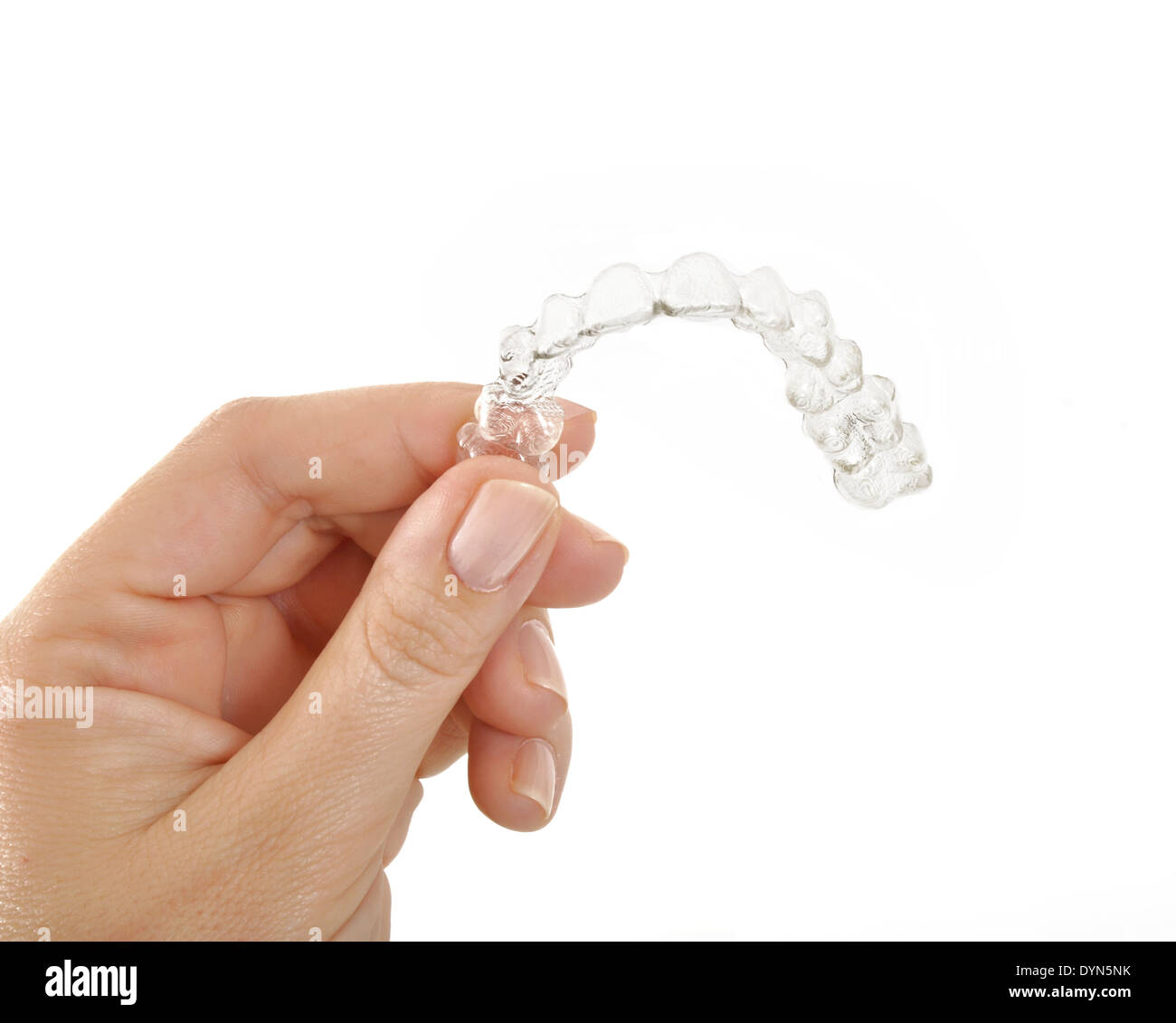 Invisible braces in a woman's hand Stock Photo