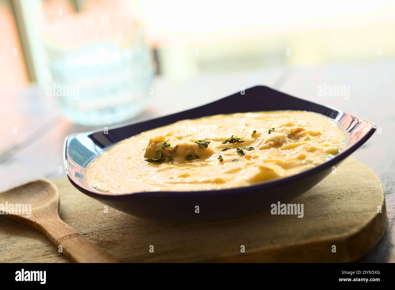 Thick yellow split pea soup with chicken Stock Photo Alamy
