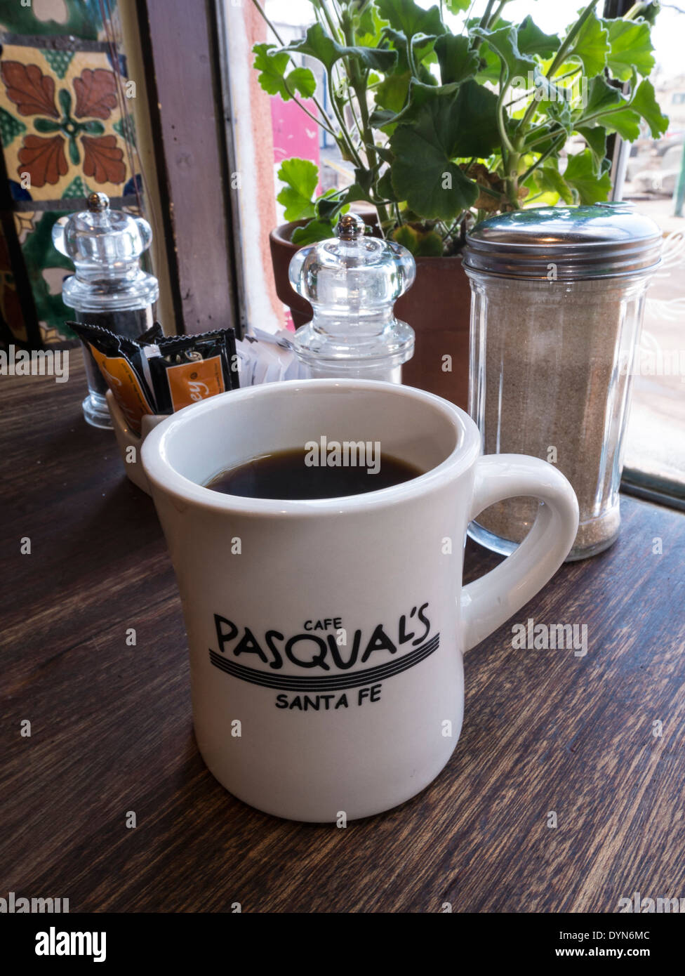 Coffee and cup, Cafe Pasqual's, downtown Santa Fe, New Mexico. Stock Photo