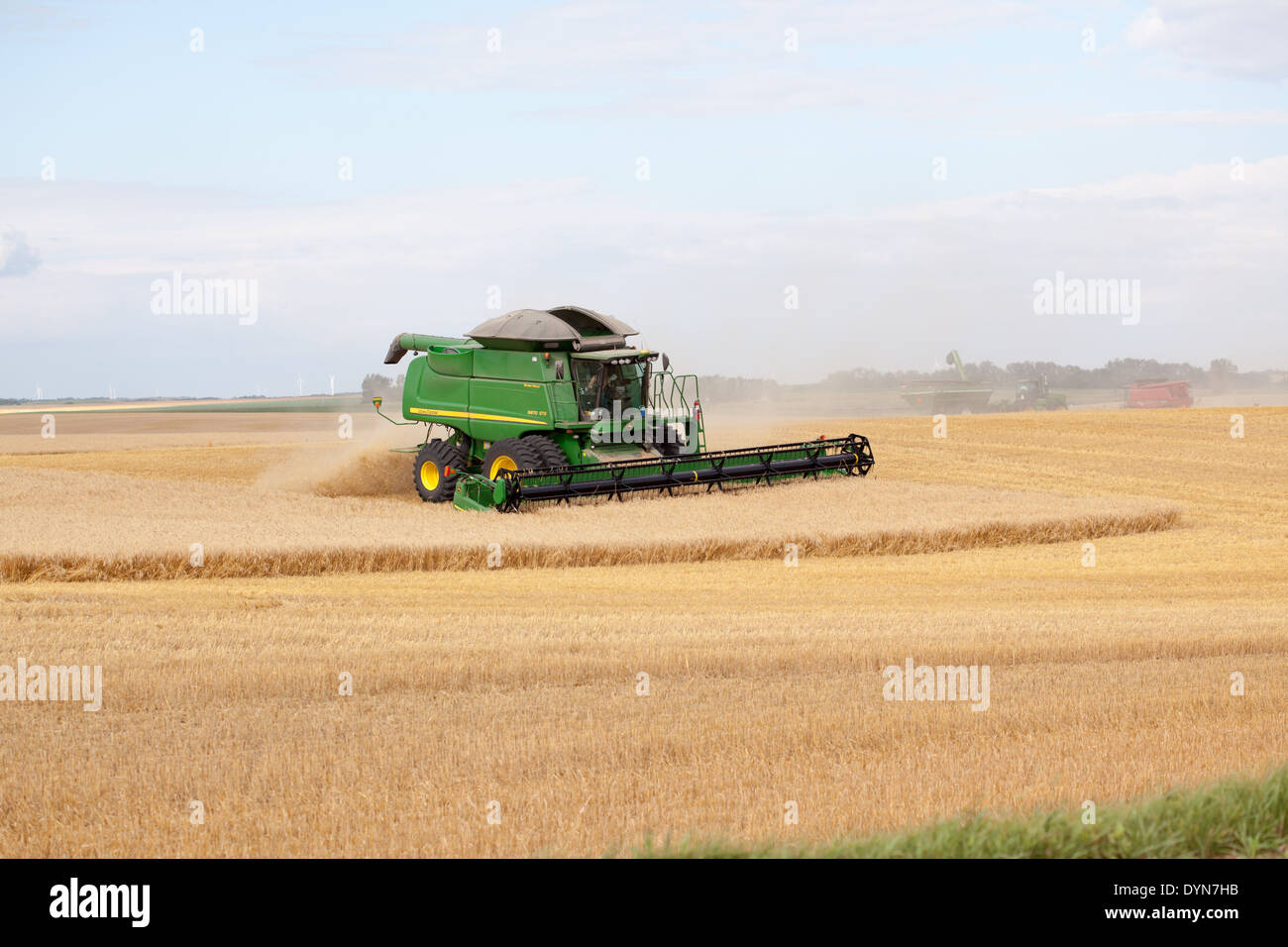 John Deere combine harvesting a crop of wheat in Pierce County, North