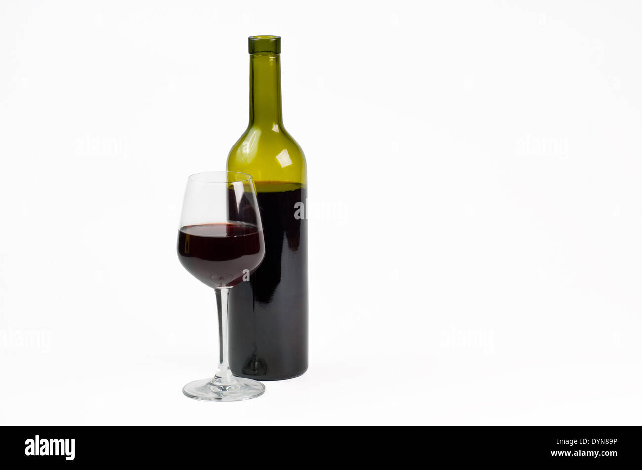 Red wine bottle and glass on white background Stock Photo Alamy