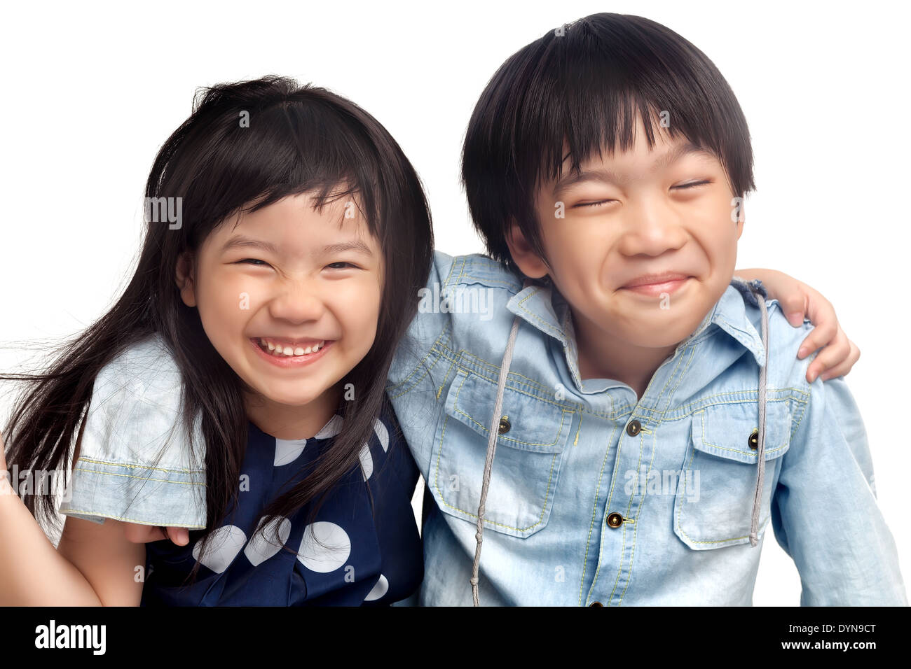 Happy kids laughing together on white background Stock Photo - Alamy