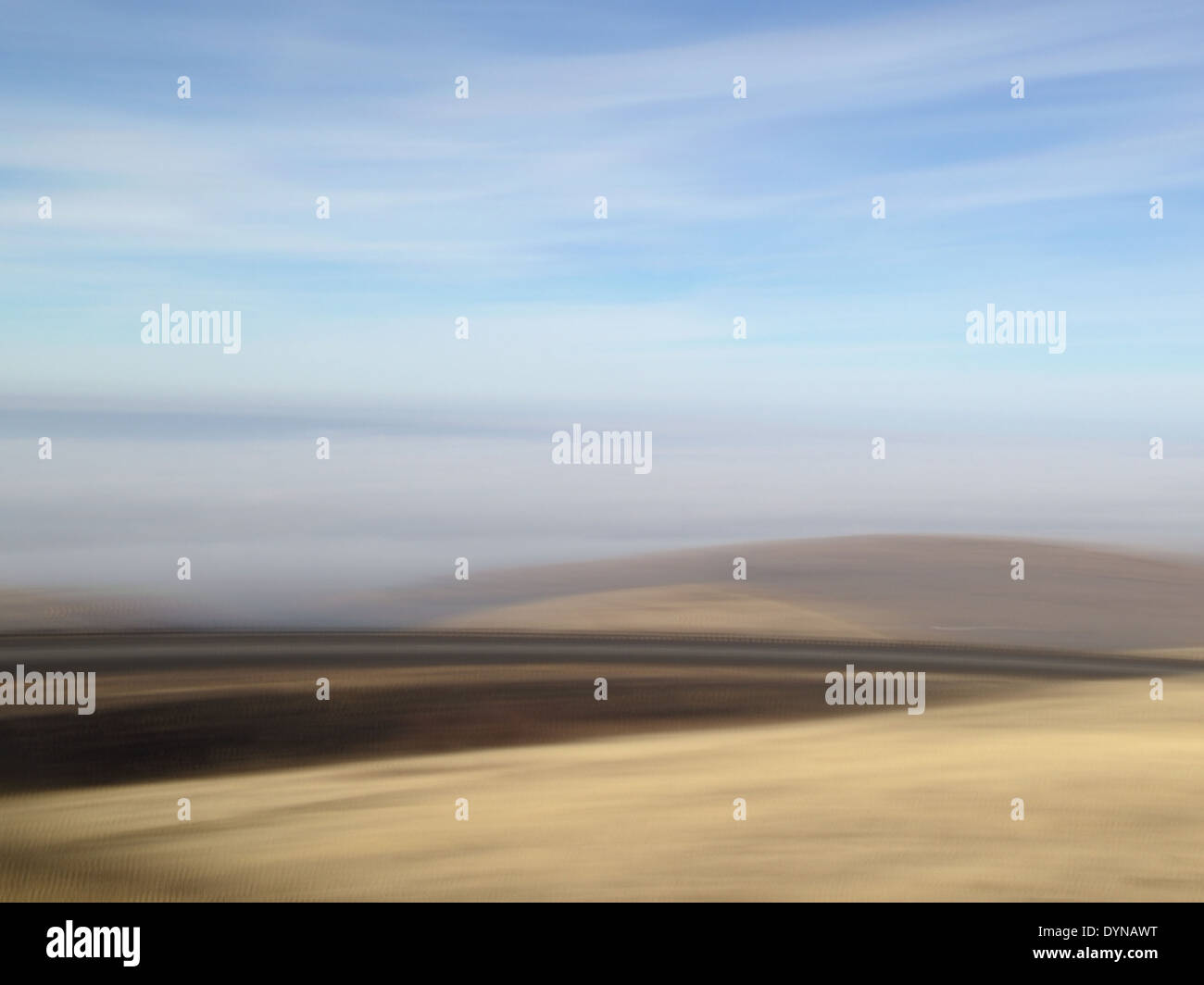 Blurred view of crop field in rural landscape - Smartphone Captured Stock Image Blurred view of crop field in rural landscape - Smartphone Captured Stock Image