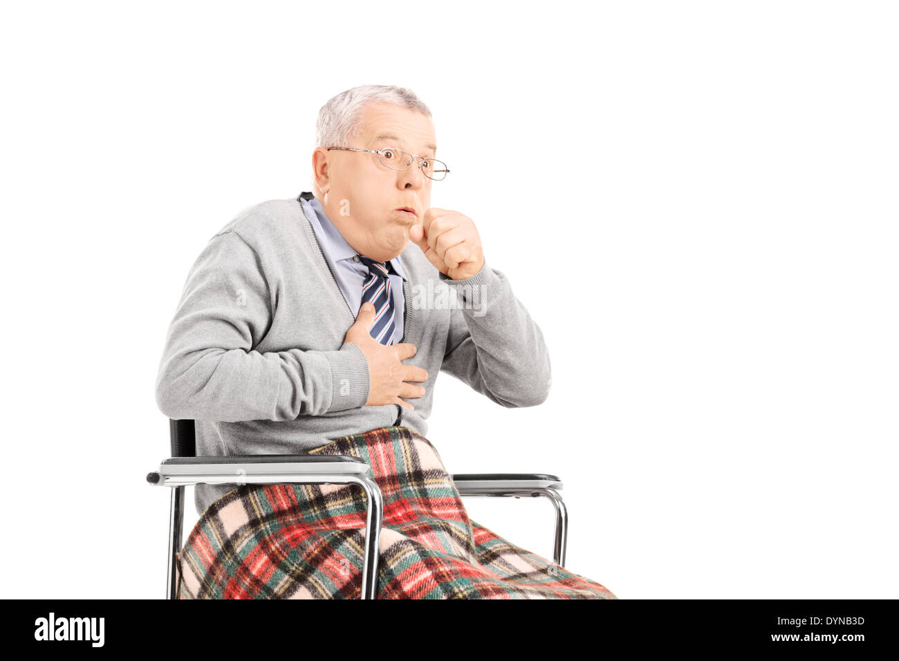 Senior man in wheelchair choking Stock Photo