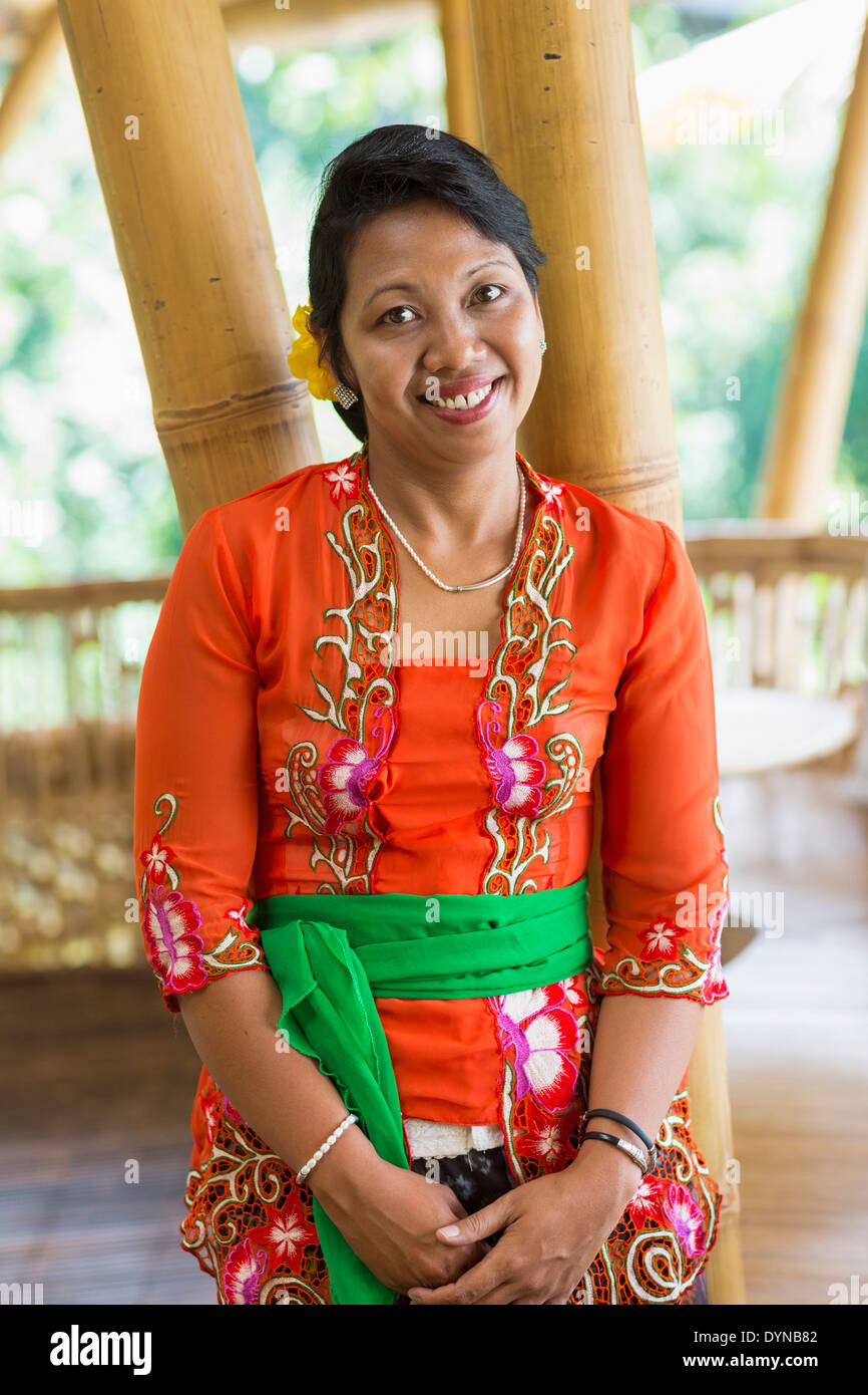 Smiling Balinese woman in traditional clothing Stock Photo