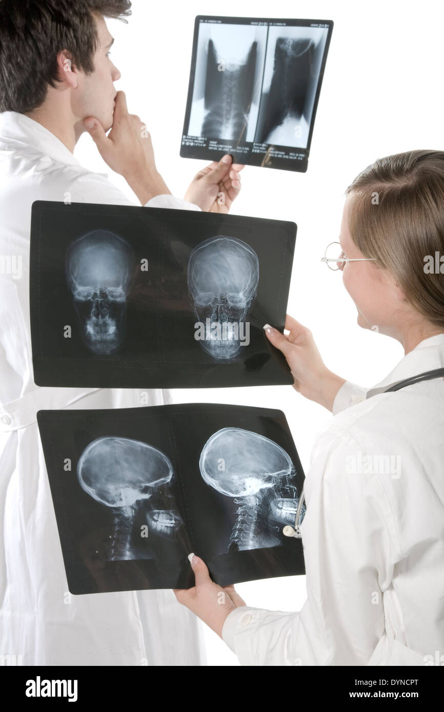 Doctors examining xrays in hospital Stock Photo Alamy