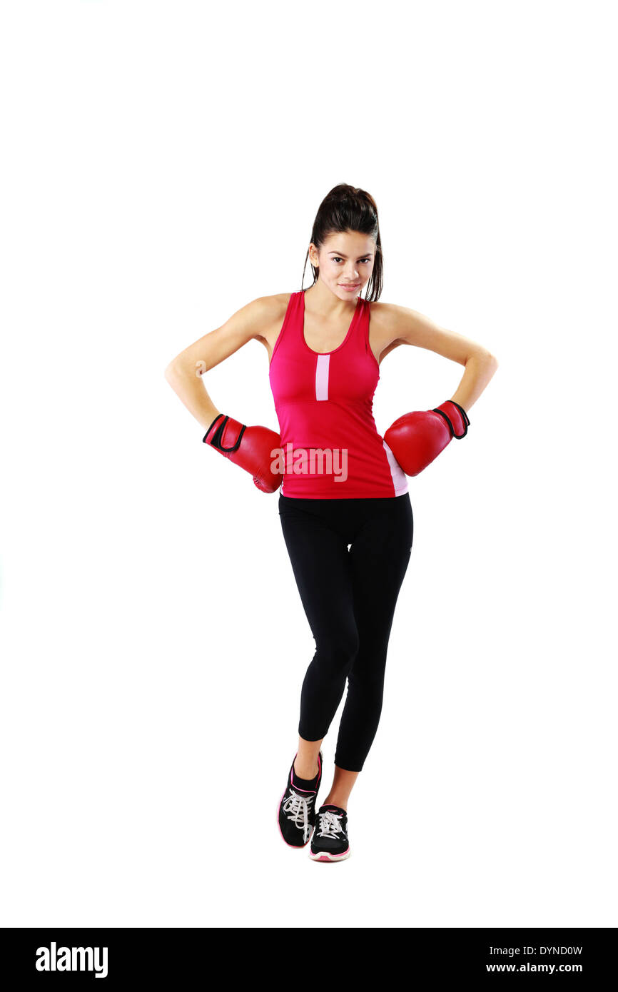 Young happy sports woman standing with boxing gloves over white background Stock Photo