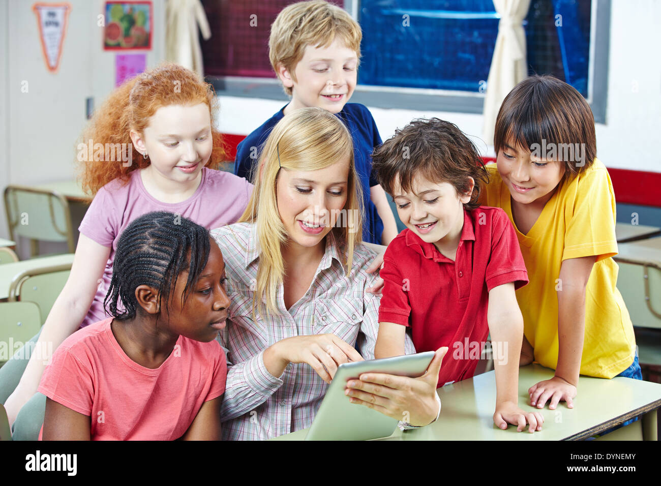 Teacher using computer school hi-res stock photography and images - Alamy