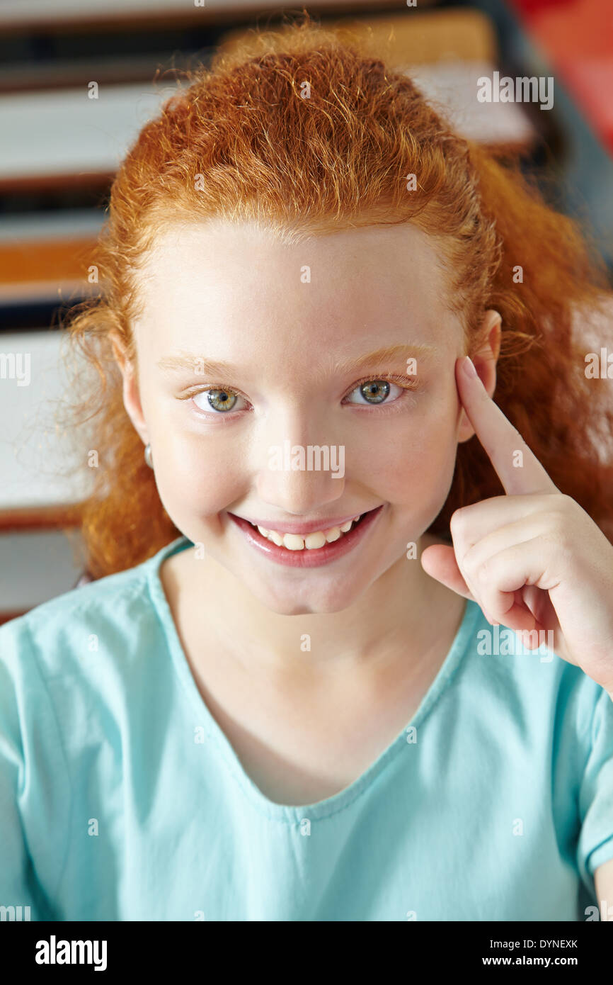 Smart girl having an idea in elementary school class Stock Photo Alamy