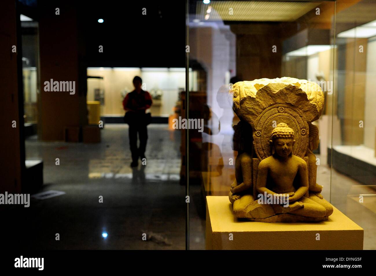 Taiyuan, China's Shanxi Province. 23rd Apr, 2014. A man passes by exhibits at Shanxi Provincial Museum in Taiyuan, capital of north China's Shanxi Province, April 23, 2014. 'India's Universe--the Exhibition of Masterworks of the Los Angeles County Museum of Art (LACMA)' is to be held in Shanxi Museum in Taiyuan on April 29. © Fan Minda/Xinhua/Alamy Live News Stock Photo