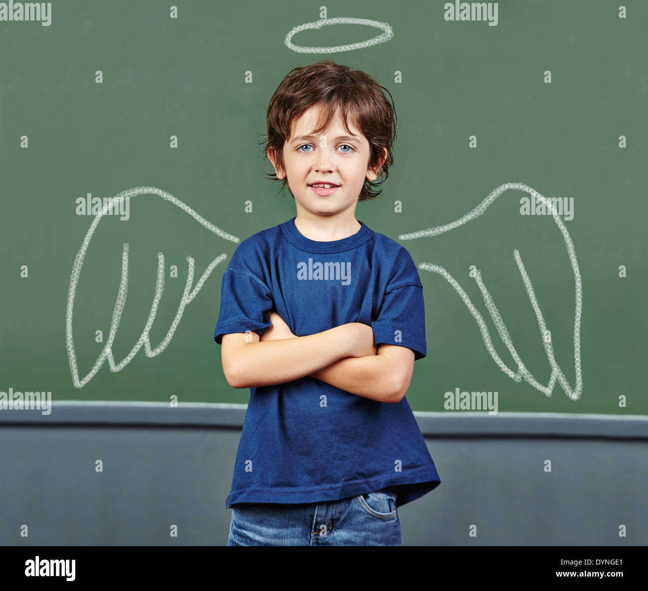 Cute child with wings and halo as guardian angel Stock Photo