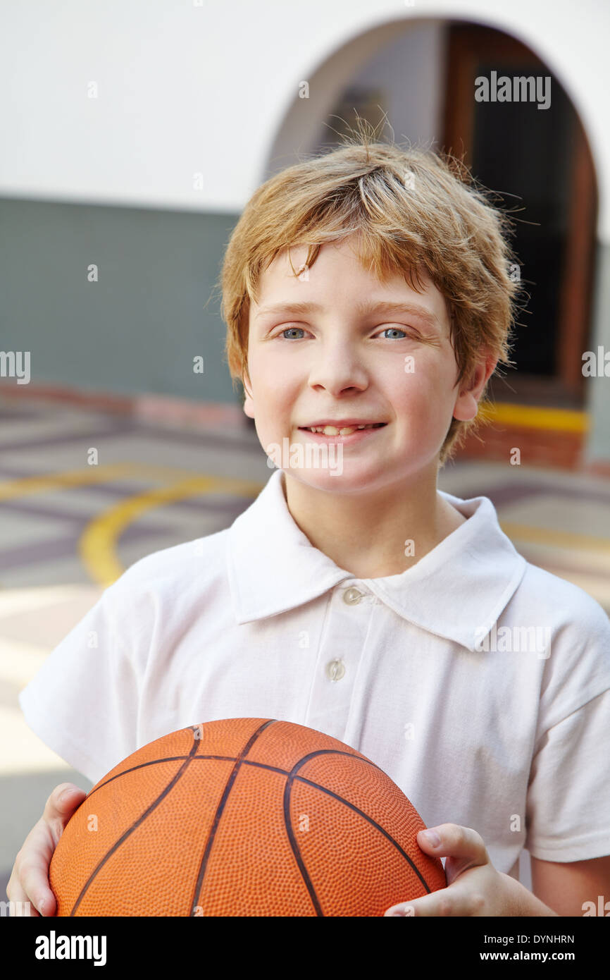 Child With Basketball In Physical Education Class In School Stock Photo Alamy child-with-basketball-in-physical-education-class-in-school-stock-photo-alamy