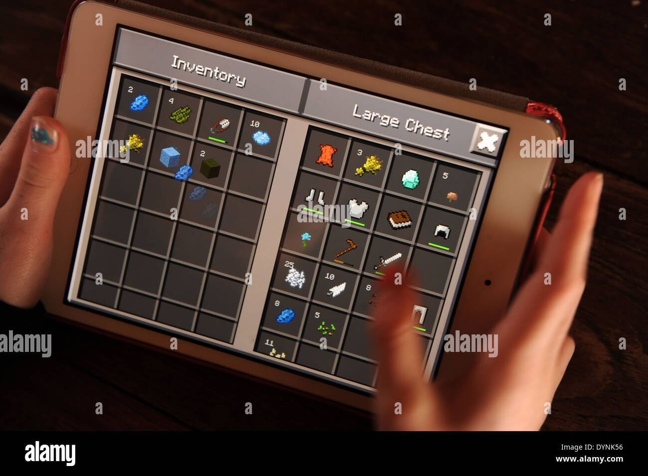 Young Girl Playing Minecraft On An Apple Ipad Stock Photo Alamy Young Girl Playing Minecraft On An Apple Ipad Stock Photo Alamy
