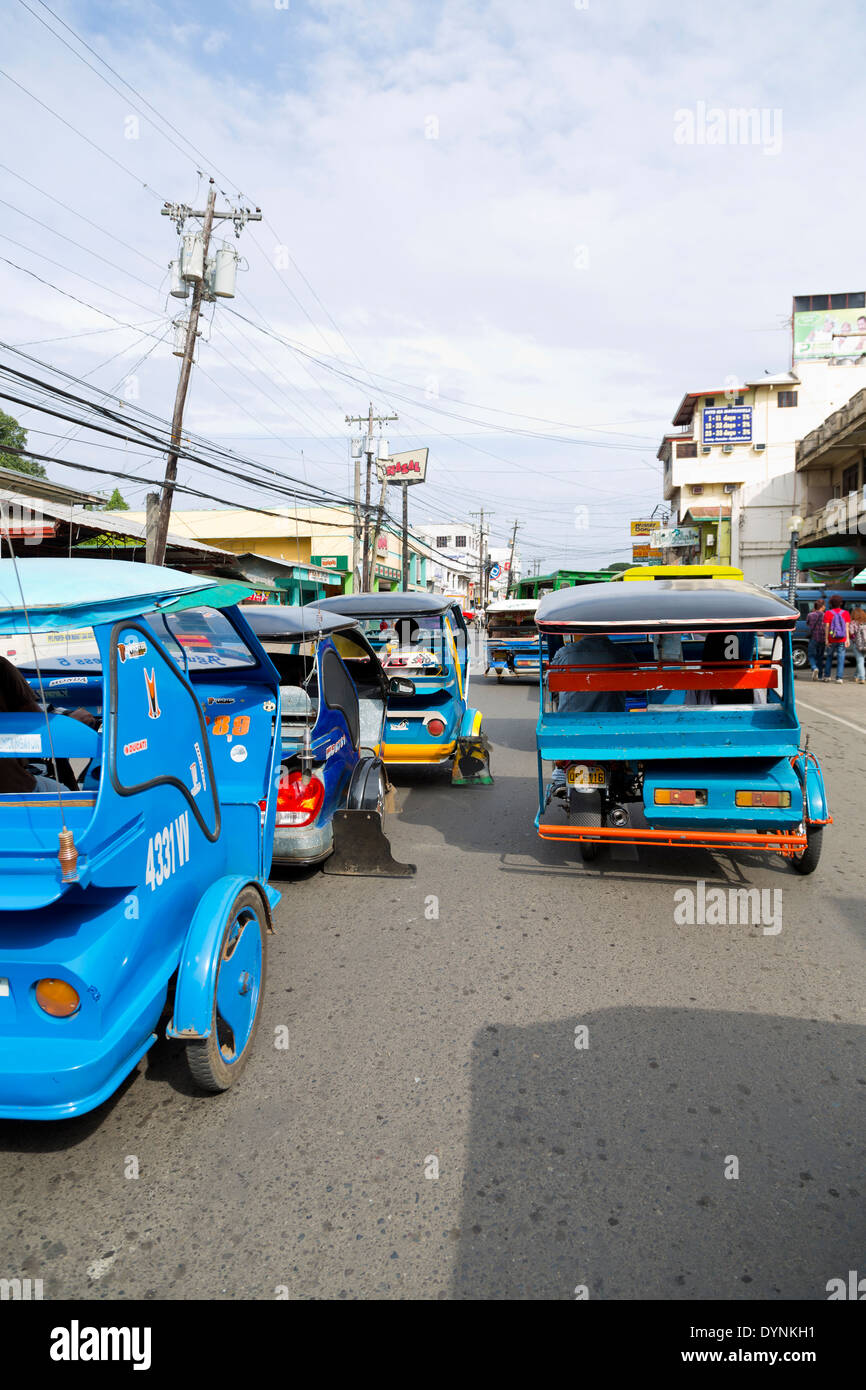 Typical Tricycles in Puerto Princesa, Palawan, Philippines Stock Photo