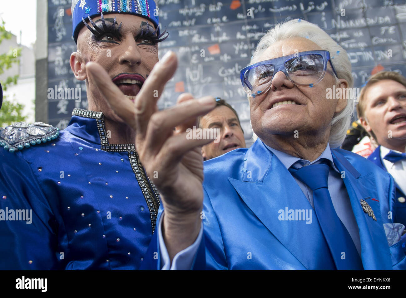 Paris, France. 19th Apr, 2014. French cabaret director, Michel Georges Alfred Catty a.k.a Michou arrival in the Michou Day flashMob in Paris, with a blue dresscode, on April 19, 2014. Around 200 people gathered, dressed in blue to throw up confetti, in Jehan Rictus Square in Montmartre, Paris. (Photo by Michael Bunel/NurPhoto) © Michael Bunel/NurPhoto/ZUMAPRESS.com/Alamy Live News Stock Photo