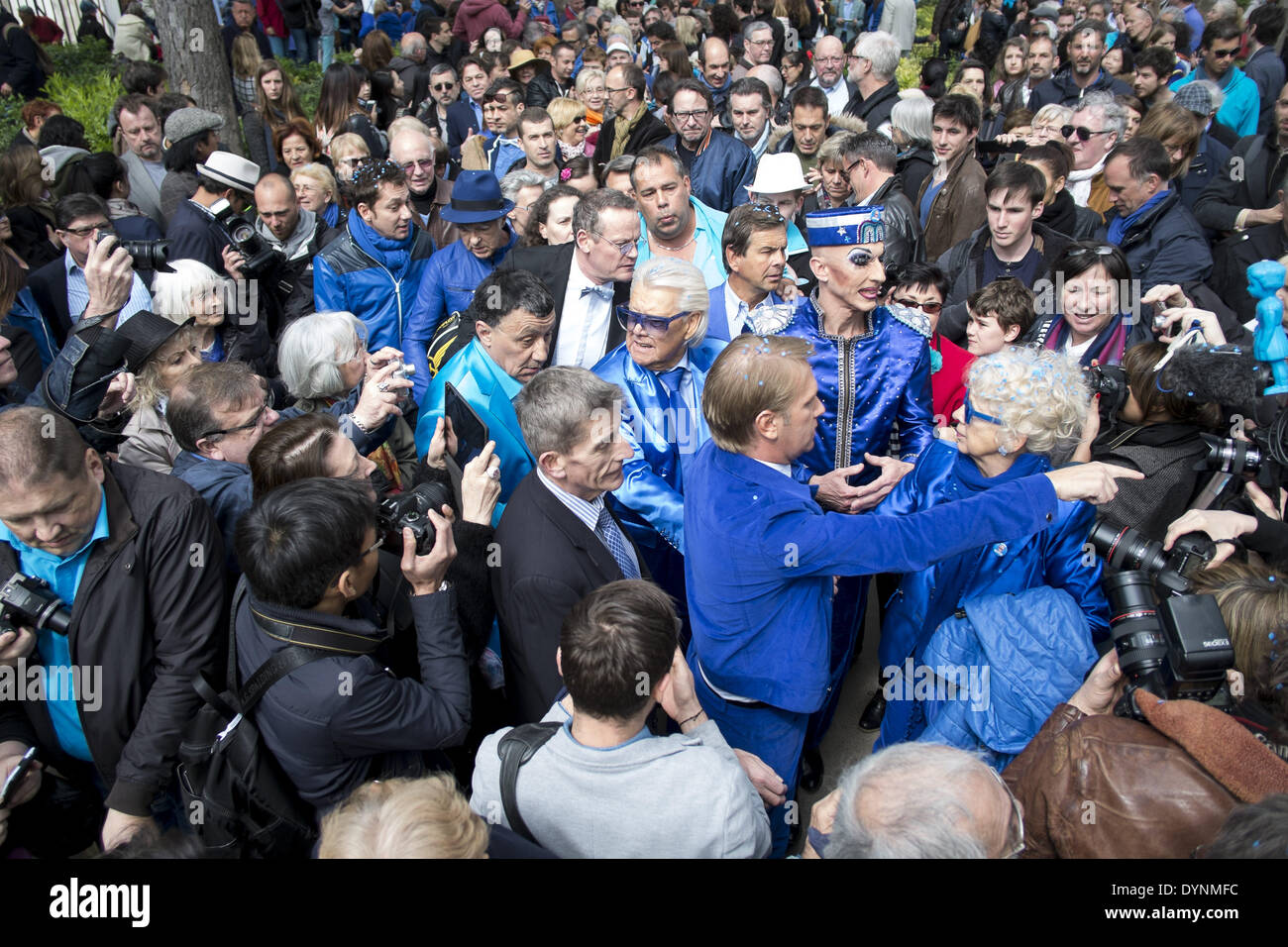 Paris, France. 19th Apr, 2014. French cabaret director, Michel Georges Alfred Catty a.k.a Michou arrival in the Michou Day flashMob in Paris, with a blue dresscode, on April 19, 2014. Around 200 people gathered, dressed in blue to throw up confetti, in Jehan Rictus Square in Montmartre, Paris. (Photo by Michael Bunel/NurPhoto) © Michael Bunel/NurPhoto/ZUMAPRESS.com/Alamy Live News Stock Photo