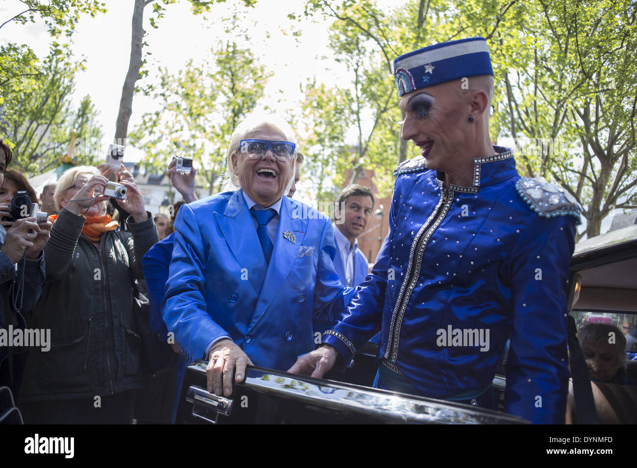 Paris, France. 19th Apr, 2014. French cabaret director, Michel Georges Alfred Catty a.k.a Michou arrival in the Michou Day flashMob in Paris, with a blue dresscode, on April 19, 2014. Around 200 people gathered, dressed in blue to throw up confetti, in Jehan Rictus Square in Montmartre, Paris. (Photo by Michael Bunel/NurPhoto) © Michael Bunel/NurPhoto/ZUMAPRESS.com/Alamy Live News Stock Photo