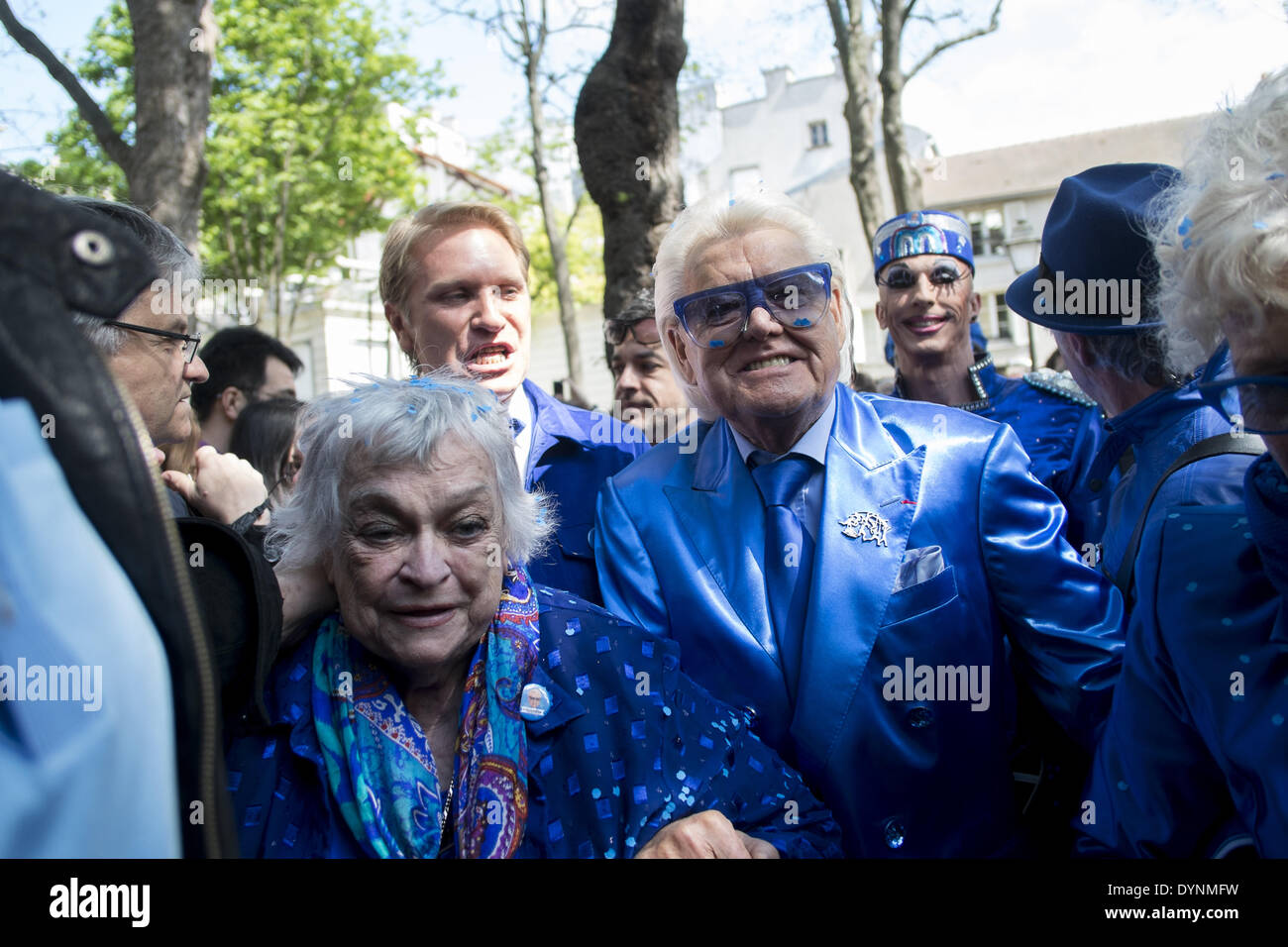 Paris, France. 19th Apr, 2014. French cabaret director, Michel Georges Alfred Catty a.k.a Michou arrival in the Michou Day flashMob in Paris, with a blue dresscode, on April 19, 2014. Around 200 people gathered, dressed in blue to throw up confetti, in Jehan Rictus Square in Montmartre, Paris. (Photo by Michael Bunel/NurPhoto) © Michael Bunel/NurPhoto/ZUMAPRESS.com/Alamy Live News Stock Photo
