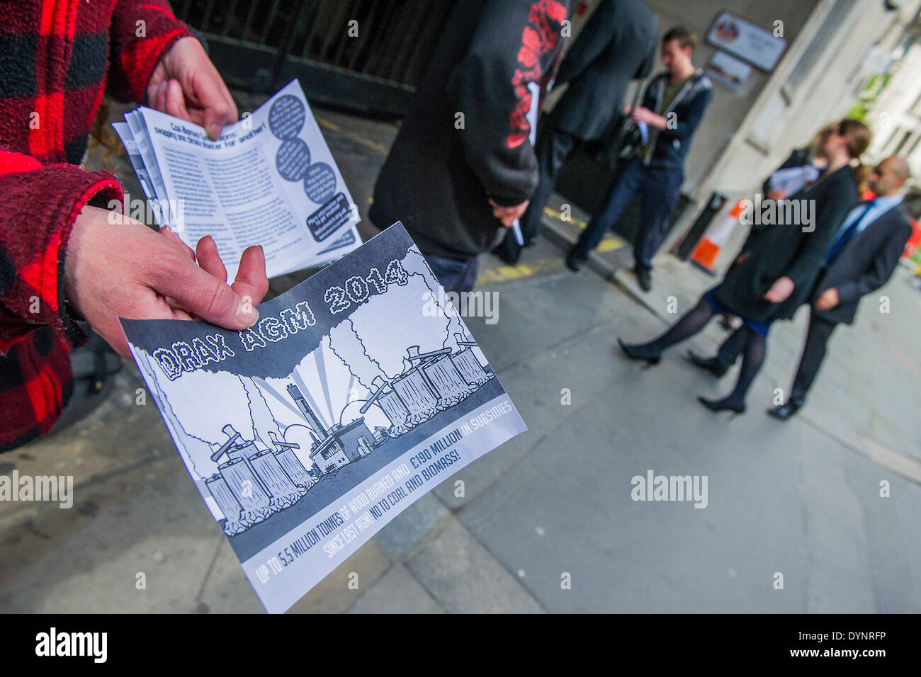 London, UK . 23rd Apr, 2014. Environmental protestors lobby Drax shareholders as they arrive for its Annual General Meeting. Grocers hall, Bank, London, UK 23 April 2014. Credit:  Guy Bell/Alamy Live News Stock Photo