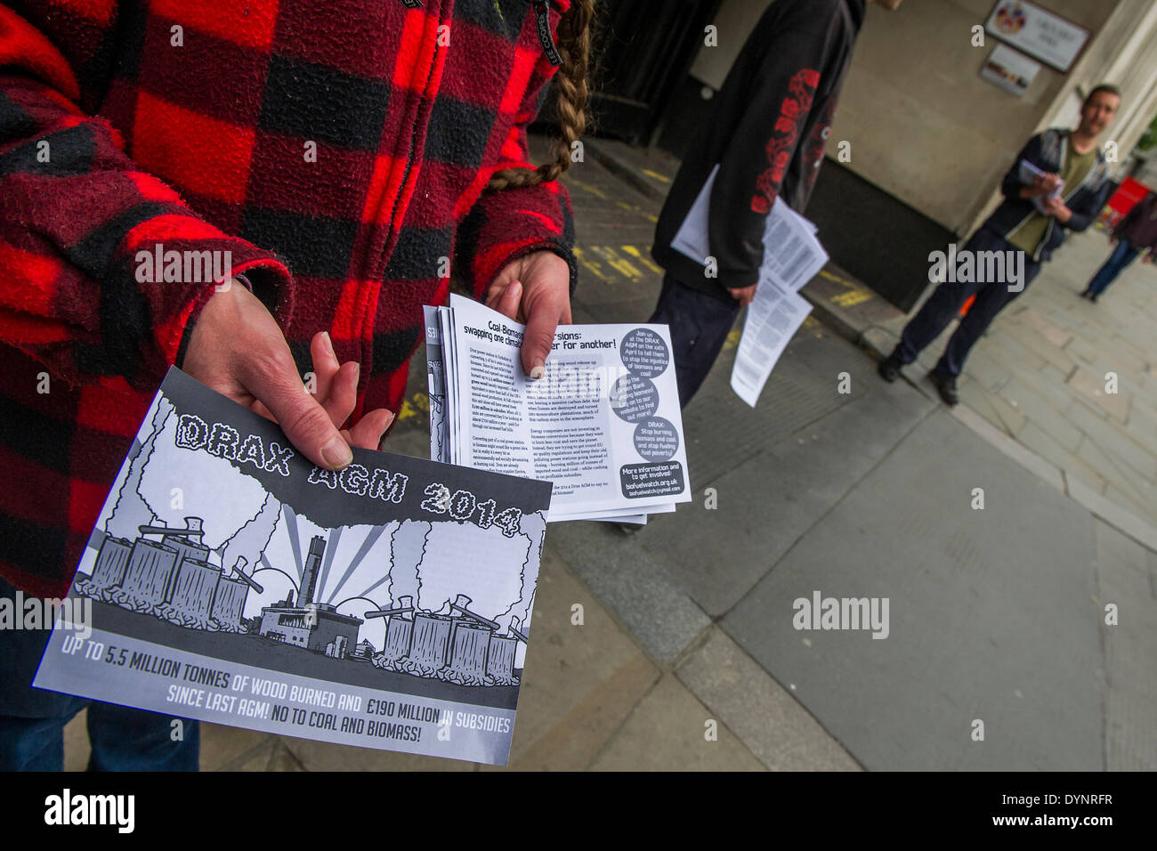 London, UK . 23rd Apr, 2014. Environmental protestors lobby Drax shareholders as they arrive for its Annual General Meeting. Grocers hall, Bank, London, UK 23 April 2014. Credit:  Guy Bell/Alamy Live News Stock Photo