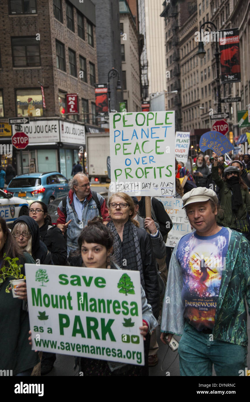 New York, NY, USA , 22nd Apr, 2014. Environmental activists rally on Earth Day at Zuccotti Park, then march to Wall Street calling for system change not climate change. The Occupy movement is still around in NYC it seems. Credit:  David Grossman/Alamy Live News Stock Photo