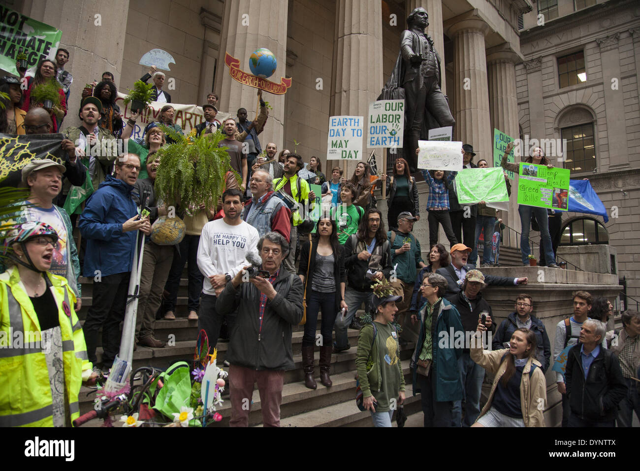 New York, NY, USA , 22nd Apr, 2014. Environmental activists rally on Earth Day at Zuccotti Park, then march to Wall Street calling for system change not climate change. The Occupy movement is still around in NYC it seems. Credit:  David Grossman/Alamy Live News Stock Photo