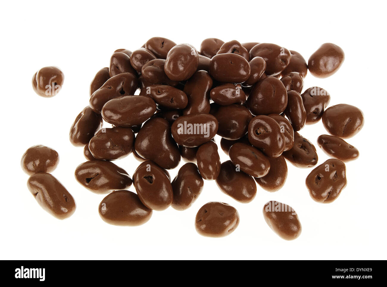 A CUTOUT OF A SCATTERING OF CHOCOLATE COATED RAISINS Stock Photo