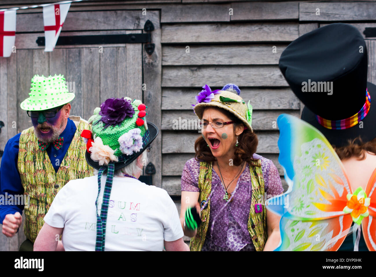 Bretforton, Evesham, Worcestershire, UK. 23rd April 2014. The Asum Gras Molly Dancers dancing at