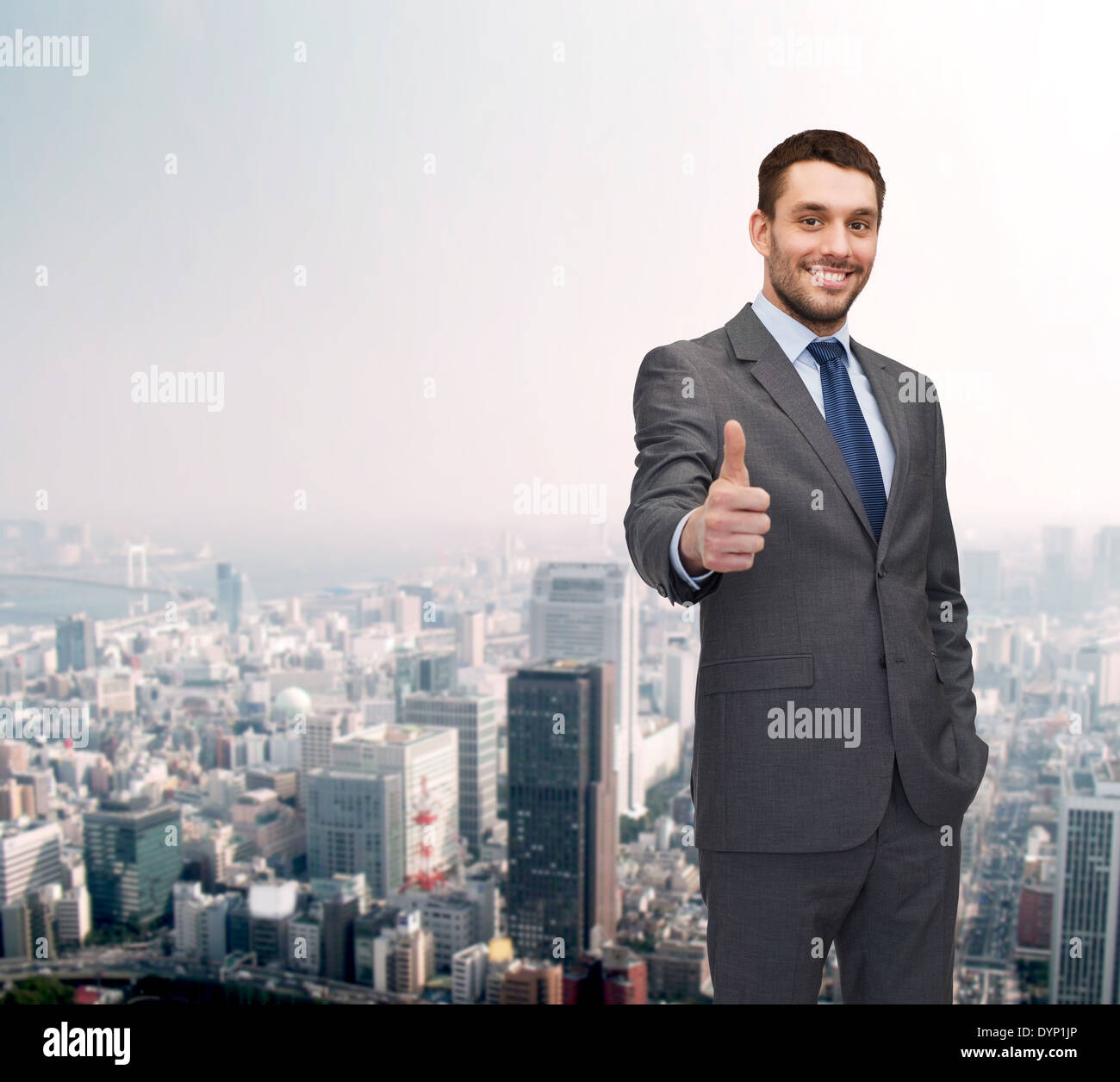handsome buisnessman showing thumbs up Stock Photo