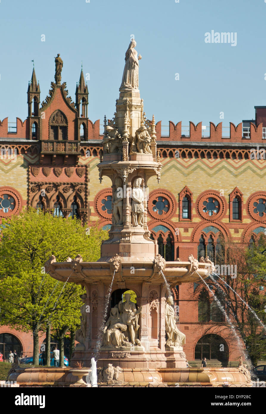 The Doulton Fountain at Glasgow Green in Glasgow, with the Templeton Carpet Factory in the background. Stock Photo