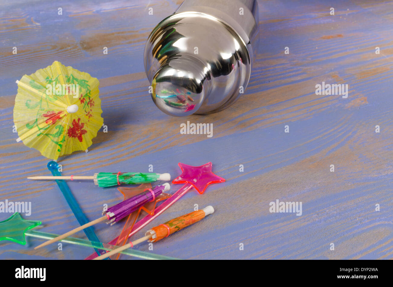 Cocktail shaker and an assortment of decorative accessories Stock Photo