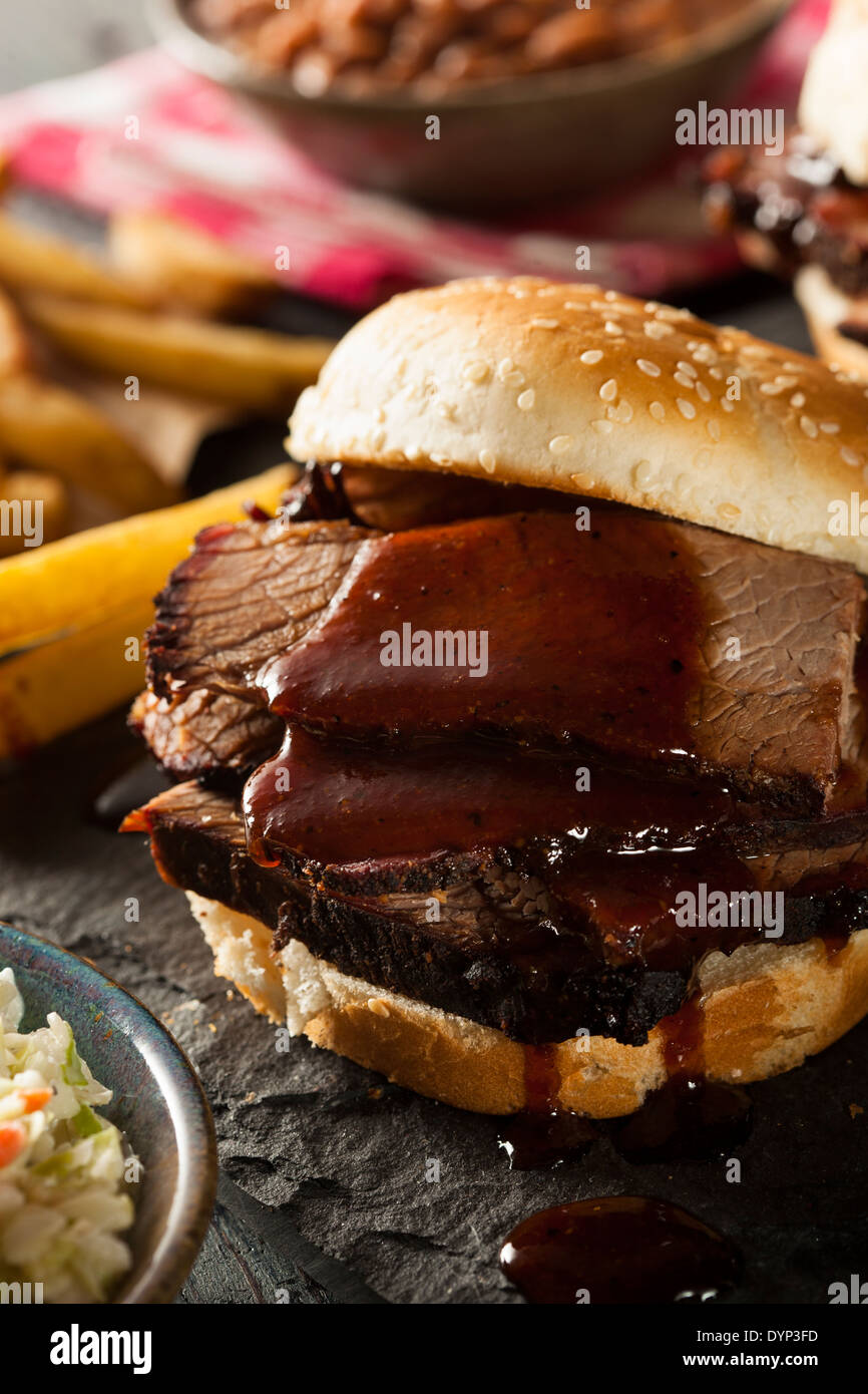 Smoked Barbecue Brisket Sandwich with Coleslaw and Bake Beans Stock