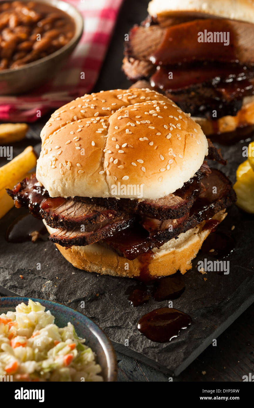 Smoked Barbecue Brisket Sandwich with Coleslaw and Bake Beans Stock