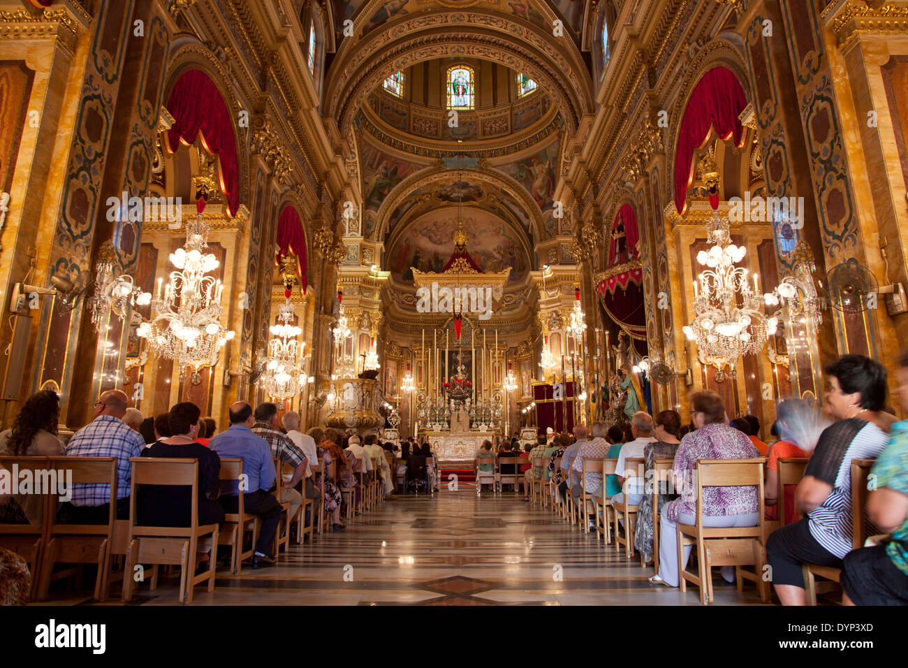 The town church of Xaghra in Malta decked out sumptuously for the feast. Stock Photo